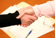 349117-349117-handshake-over-signed-contract